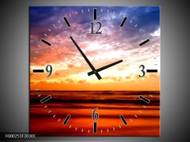 Wandklok op Canvas Zonsondergang | Kleur: Rood, Blauw, Geel | F000251C